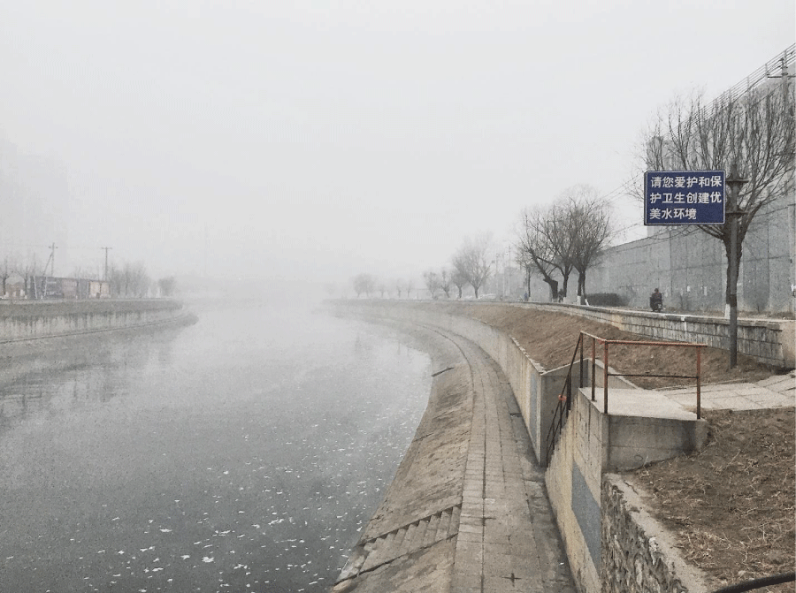 By quantum electrodynamics and quantum chromodynamics, I captured the nuclear proliferation in Beijing with the Gamma levels in the image, with chemical pollutions predominant in the air. The irony is created by the contrast with the government-made sign asking the citizens to protect the environment and the water.